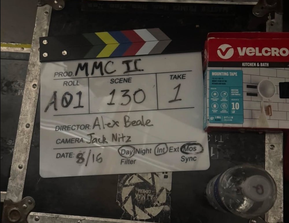 The slate reading MMC II, scene 130, take 1