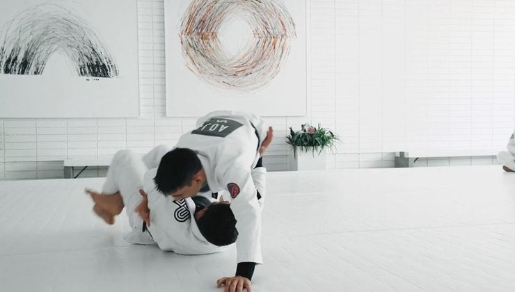 Switching Hips to Knee Slide Pass Versus Half Guard