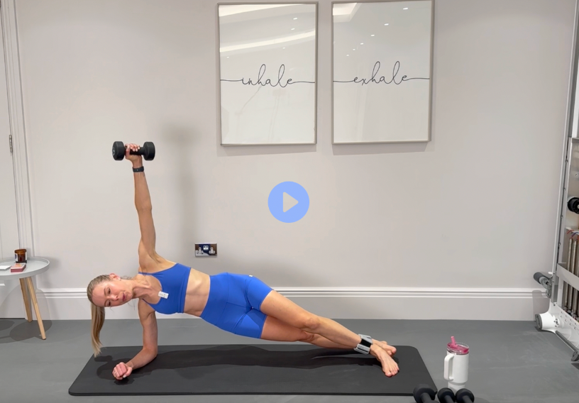 Pilates Power: bright-blue workout set, in a side plank with a dumbbell raised overhead.