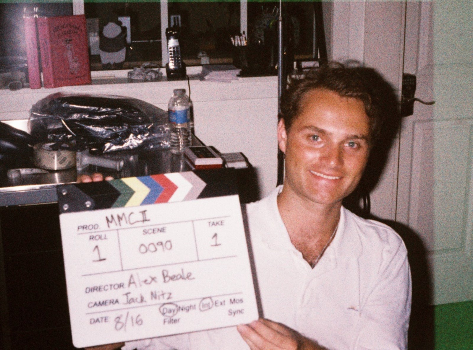 Colt Waller holding the slate on the set of Midnight Movie Club II