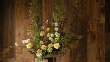 Large dish of spring flowers and foliage