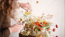 Autumnal arrangement in shallow dish