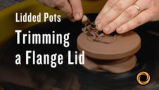 Trimming a Flange Lid