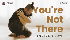 Young Ho sitting down, hugging himself