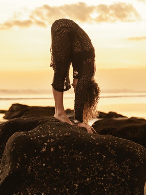 fold forward relaxing stretch to feel calm and soft