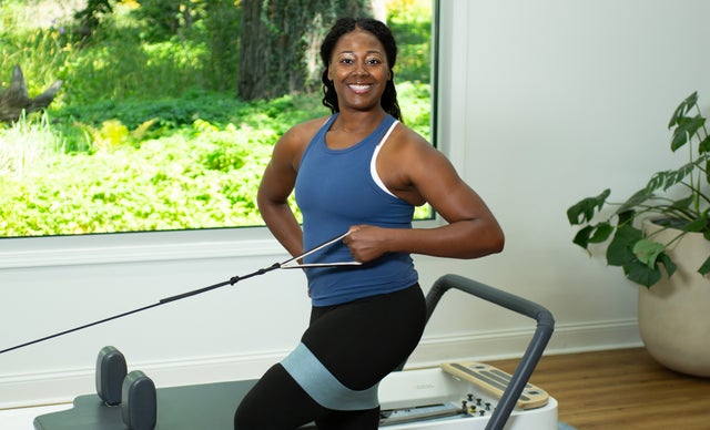 Member training on Pilates equipment for P&FTV All-Access