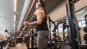 Banded external shoulder rotations superset with back & forth shoulder raise